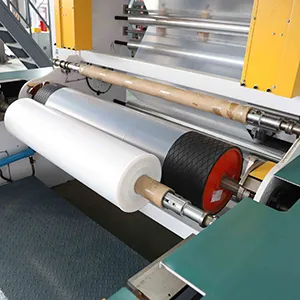 Rewinding and cutting system