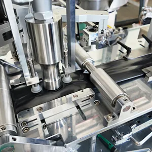 Ultrasonic automatic hole punching unit